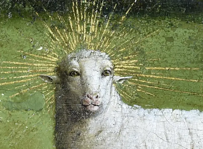 Shock at lamb’s ‘alarmingly humanoid’ face in restored Renaissance masterpiece