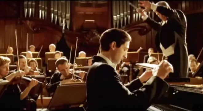 American actor Adrien Brody plays piano in The Pianist