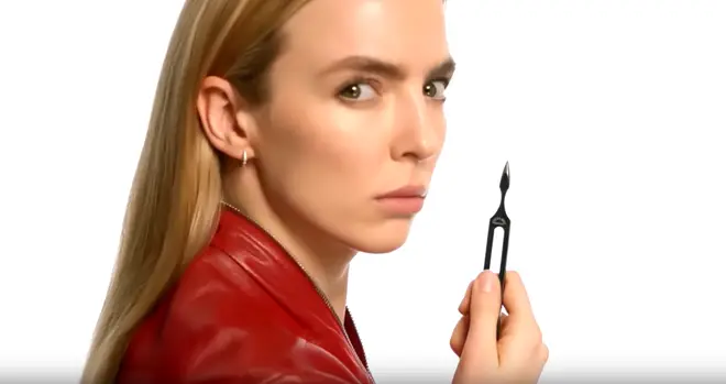 Jodie Comer as Villanelle in the ‘Killing Eve’ Season 3 trailer holding a tuning fork