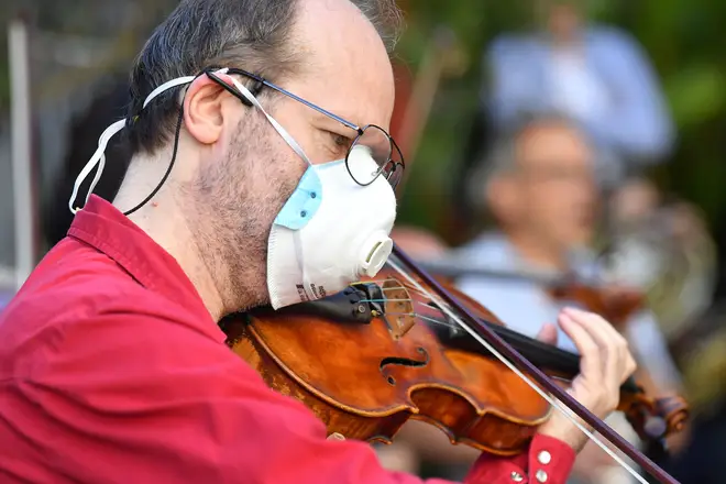 Musicians perform in protest of being stood down without pay.