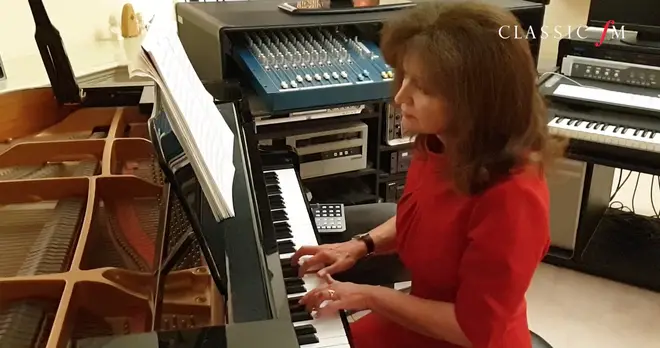 Composer Debbie Wiseman performs her piece, Together, at her home studio.