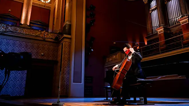 Cellist Václav Petr is pictured in the Rudolfinum in Prague, performing at a benefit concert ‘without an audience’ hosted by the Czech Philharmonic