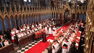Choir members take their place in Westminster Abbey, London