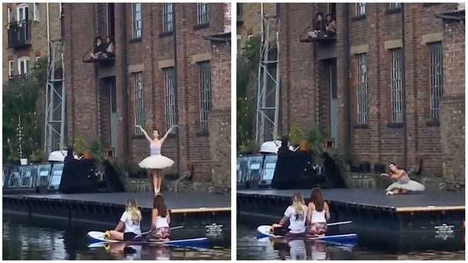 Solo ballerina on London canalside is watched by passing canoeists