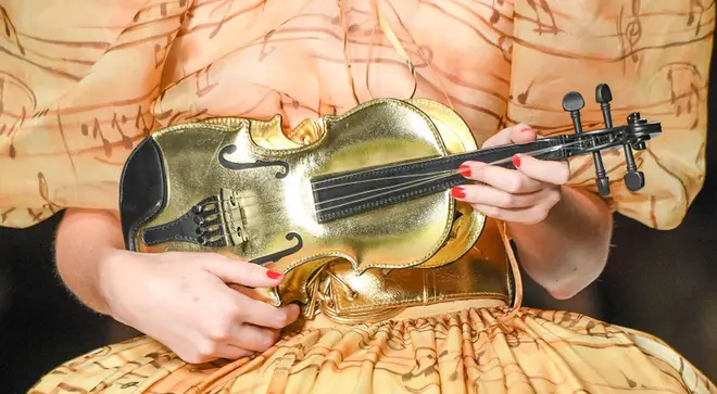 A high fashion brand is selling the most extra violin handbag, and