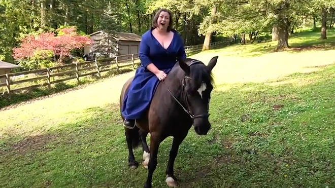 Singing opera on a horse