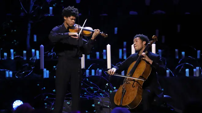 Cellist Sheku Kanneh-Mason performs with his older brother, violinist Braimah for Holocaust Memorial Day Commemorative Ceremony at Methodist Central Hall in London.