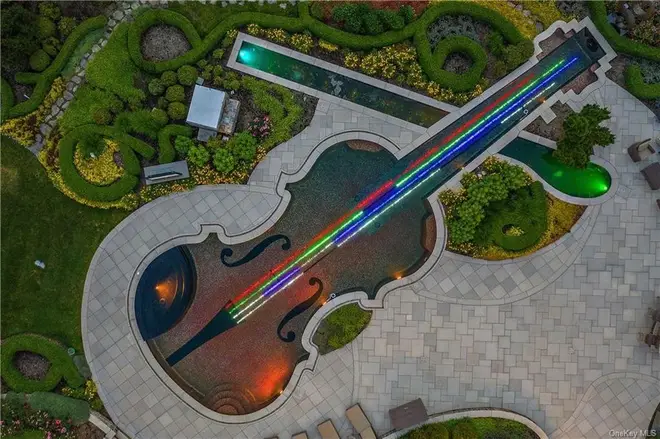 The violin-shaped pool took 15 months to complete