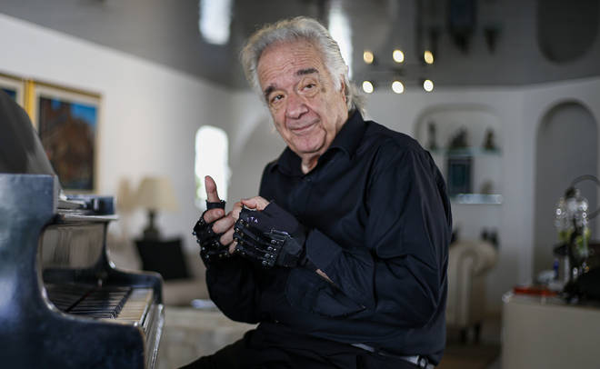 Maestro João Carlos Martins is able to fully play the piano again, thanks to these bionic gloves