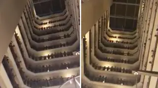 Amazing high school students sing ‘Down to the River to Pray’ from hotel balconies