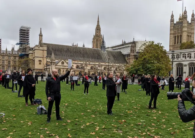 150 professional opera singers protest in Parliament Square