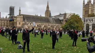 150 professional opera singers protest in Parliament Square