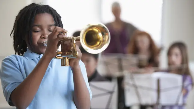 Boy playing trumpet