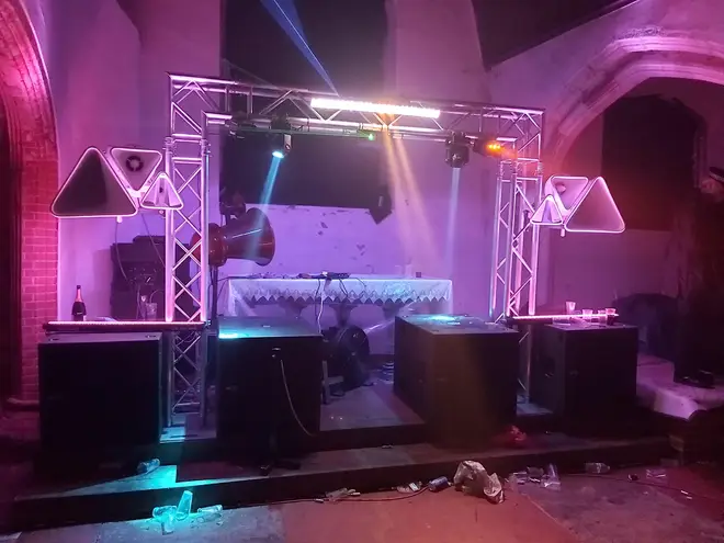 Rave organisers set up DJ decks in the church