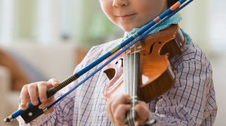 Russian mother taken to court as 9-year-old boy’s violin playing ‘breaks local noise laws’