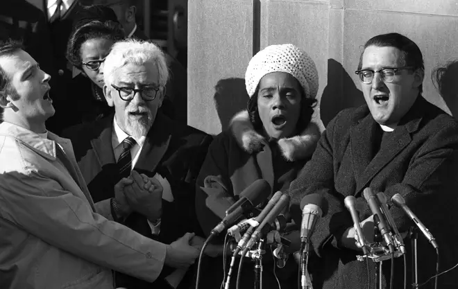 Coretta Scott King joins hands and sings with antiwar protestors