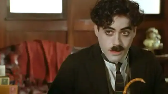 Robert Downey Jr as Charlie Chaplin