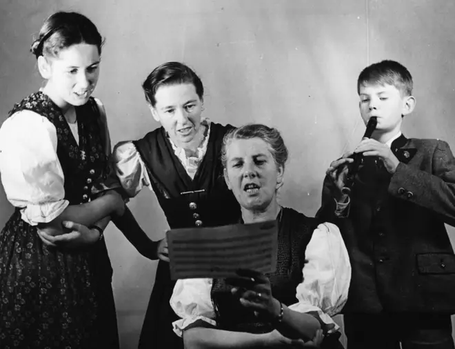 Baroness Maria von Trapp sings with some of her children