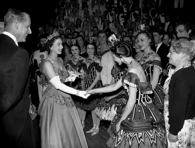 1958: The Queen and Duke of Edinburgh meet a member of the Royal Ballet after the gala performance in celebration of the centenary of the Royal Opera House, Covent Garden.