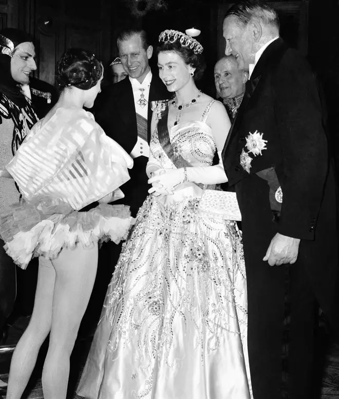 1957: The Duke of Edinburgh attends a soirée at Paris’ Palais Garnier in honour of his wife, Queen Elizabeth