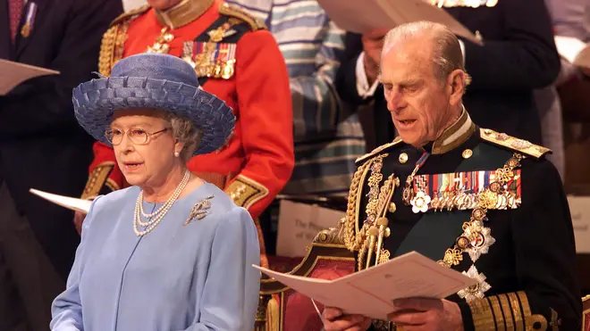 2002: Queen Elizabeth II and the Duke of Edinburgh sing hymns at St Paul's Cathedral during a service of Thanksgiving to celebrate The Queen's Golden Jubilee.
