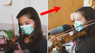 Incredible footage shows young, one-handed girl playing violin with ingenious prosthetic device