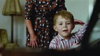 Elton John as a boy at the piano