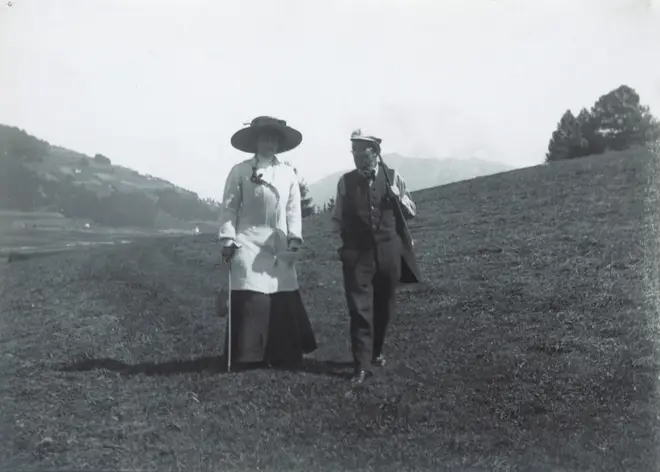 Austrian composer Gustav Mahler and his wife Alma take a stroll nearby their summer residence in Toblach. (1909)