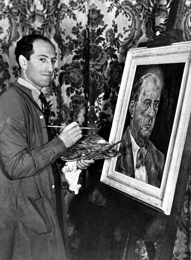 George Gershwin photographed while painting a portrait of Austrian composer Arnold Schonberg