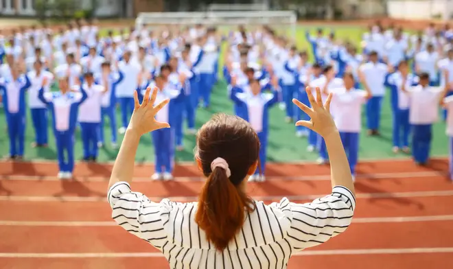 Students with hearing impairment perform China's national anthem in sign language in Haikou