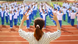 Students with hearing impairment perform China's national anthem in sign language in Haikou