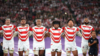 Japan players sing the national anthem prior to the Rugby World Cup 2019 at the Tokyo Stadium