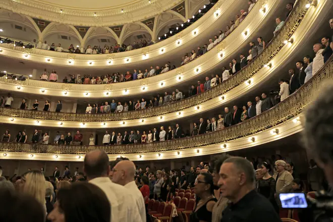 Cuba's President Miguel Diaz Canel listens to the national anthem at the Festival International de Ballet