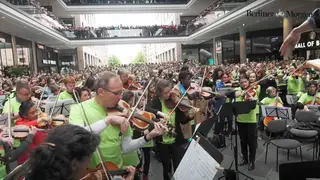 Watch this joyous classical music flashmob transform a mall into a moment of beauty