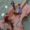 Watch a sublime string quartet serenade Venetians with Vivaldi on a boat shaped like a violin