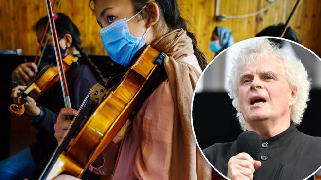 Sir Simon Rattle urges UK government to offer humanitarian visas to silenced Afghan musicians