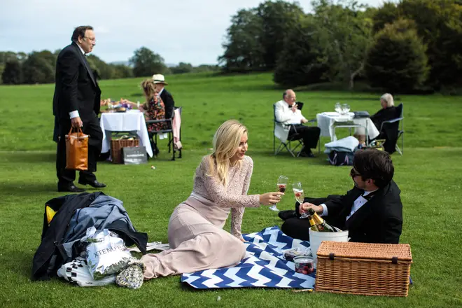 Glyndebourne festival goers attend a picnic during the interval