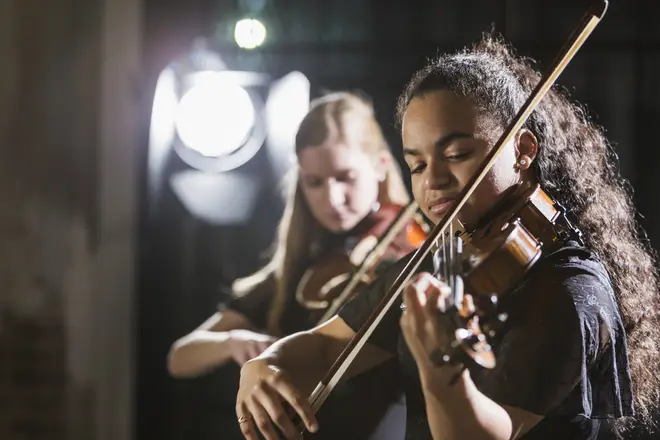 String players performing