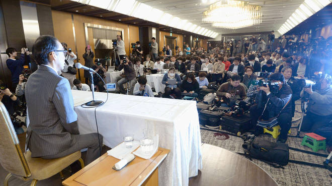 Takashi Niigaki holds a press conference at a Tokyo hotel on Feb. 6, 2014, the day after.