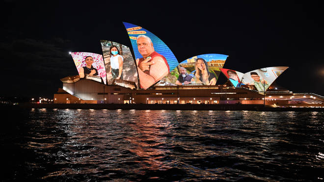 Sydney Opera House Sails Light Up In Tribute To Frontline Workers As NSW Reaches 80% Vaccine Milestone