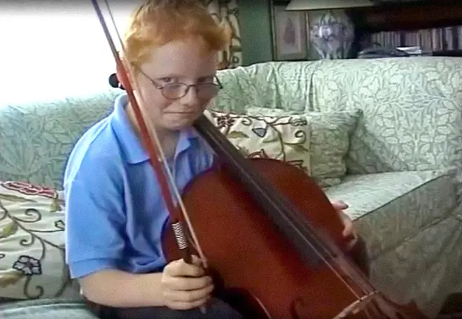 A young Sheeran looks thrilled to be playing the cello