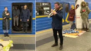A Ukrainian musician plays the National Anthem in a metro station being used as a bomb shelter