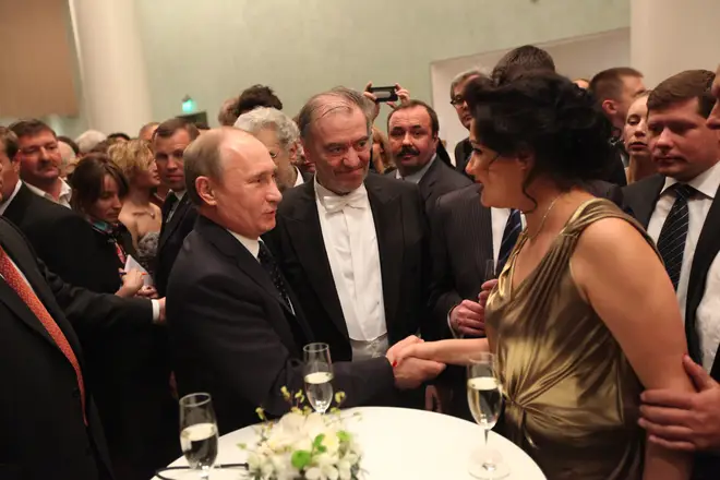 (L-R) Russian President Vladimir Putin, conductor Valery Gergiev and soprano Anna Netrebko. May 2013