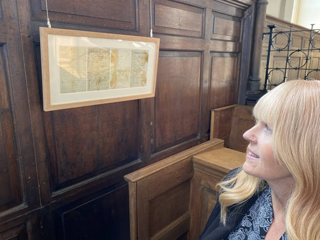 Centre manager Tracey Mienie sits in the pew where the letter was found.