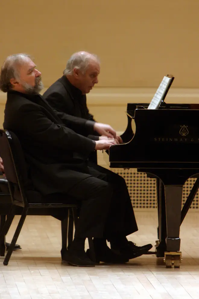 Radu Lupu performs alongside Daniel Barenboim at New York's Carnegie Hall in 2006.