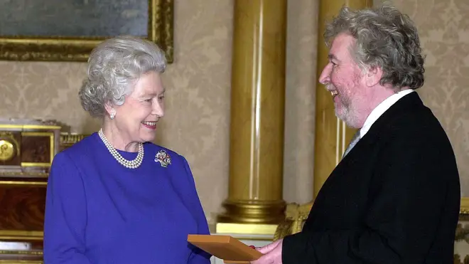 The Queen receives Sir Harrison Birtwistle to invest him with the Insignia of a Companion of Honour at Buckingham Palace