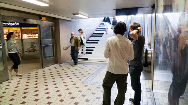 Commuters use piano stairs in Stockholm, Sweden