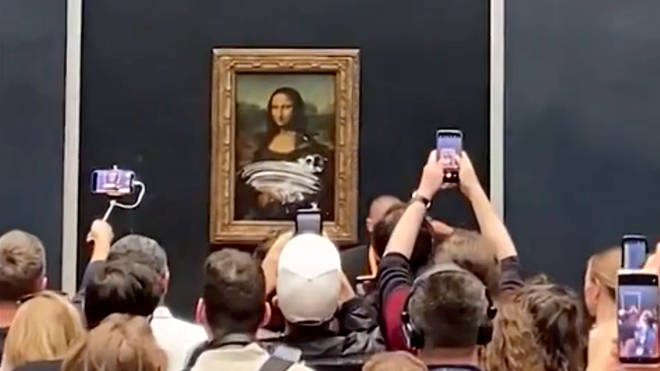The painting survived the protester's smear campaign