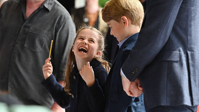 Princess Charlotte tries her hand at conducting an orchestra at Cardiff Castle