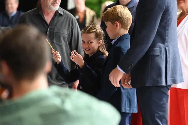 Princess Charlotte 'conducts' band at Cardiff Castle during royal visit